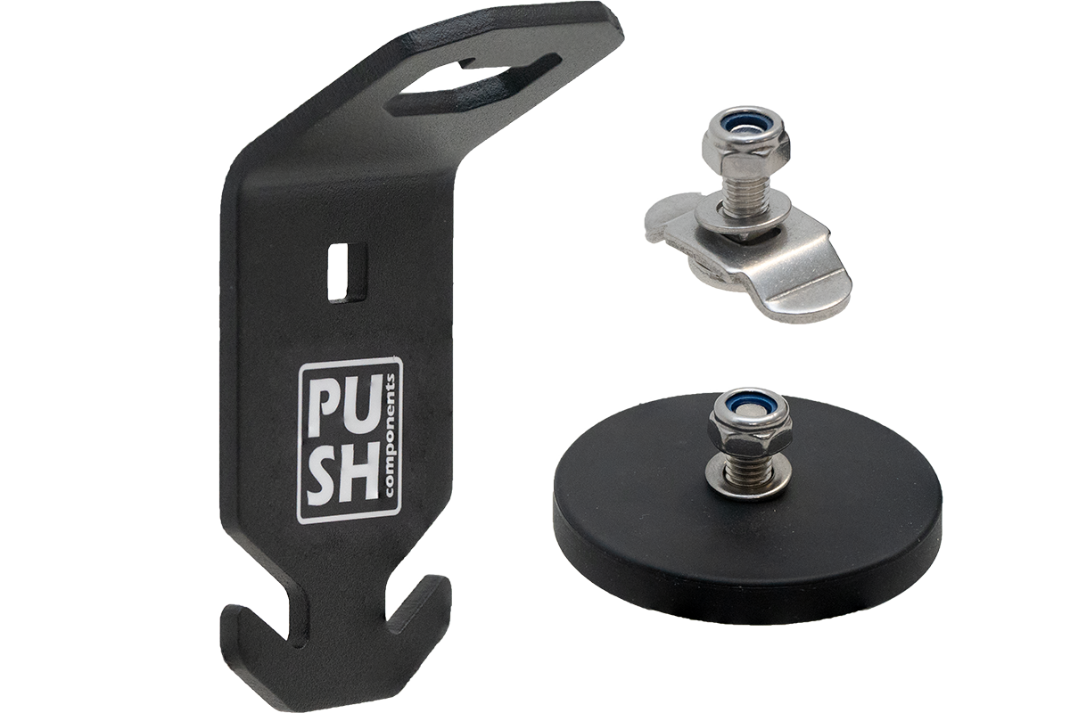 This picture shows the product PUSHrack bottle opener called BLOP, with which you can not only open your bottle but also hang a bin bag on the hook provided on the bottle opener.