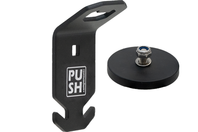 This picture shows the product PUSHrack bottle opener called BLOP, with which you can not only open your bottle but also hang a bin bag on the hook provided on the bottle opener.