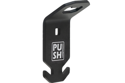 This picture shows the product PUSHrack bottle opener called BLOP, with which you can not only open your bottle but also hang a bin bag on the hook provided on the bottle opener.