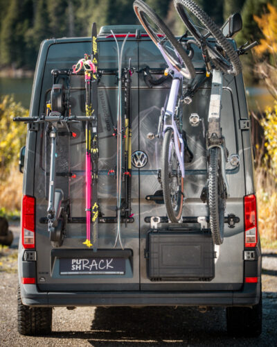 PUSHrack rear carrier with bicycle, cross-country skis, and e-scooter on a VW Crafter – modular airline rail carrier for campers and vans from PUSH components