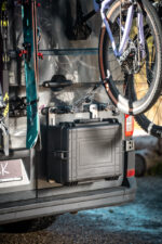 PUSHrack box mounted below two bicycles on a campervan, showing the PUSHrack bike rack with tyre holder and gravel adapter