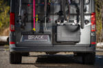 PUSHrack box mounted on a campervan with Room Extender below two bicycles on the rear doors, box closed
