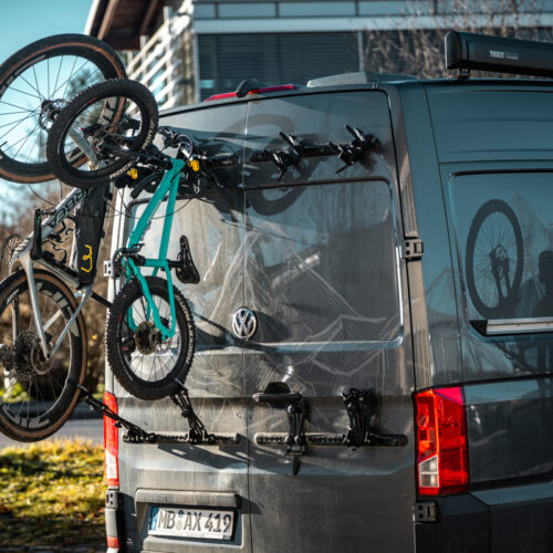 Gravel adapter mounted on PUSHrack V3 bike rack for gravel bike transport on camper van